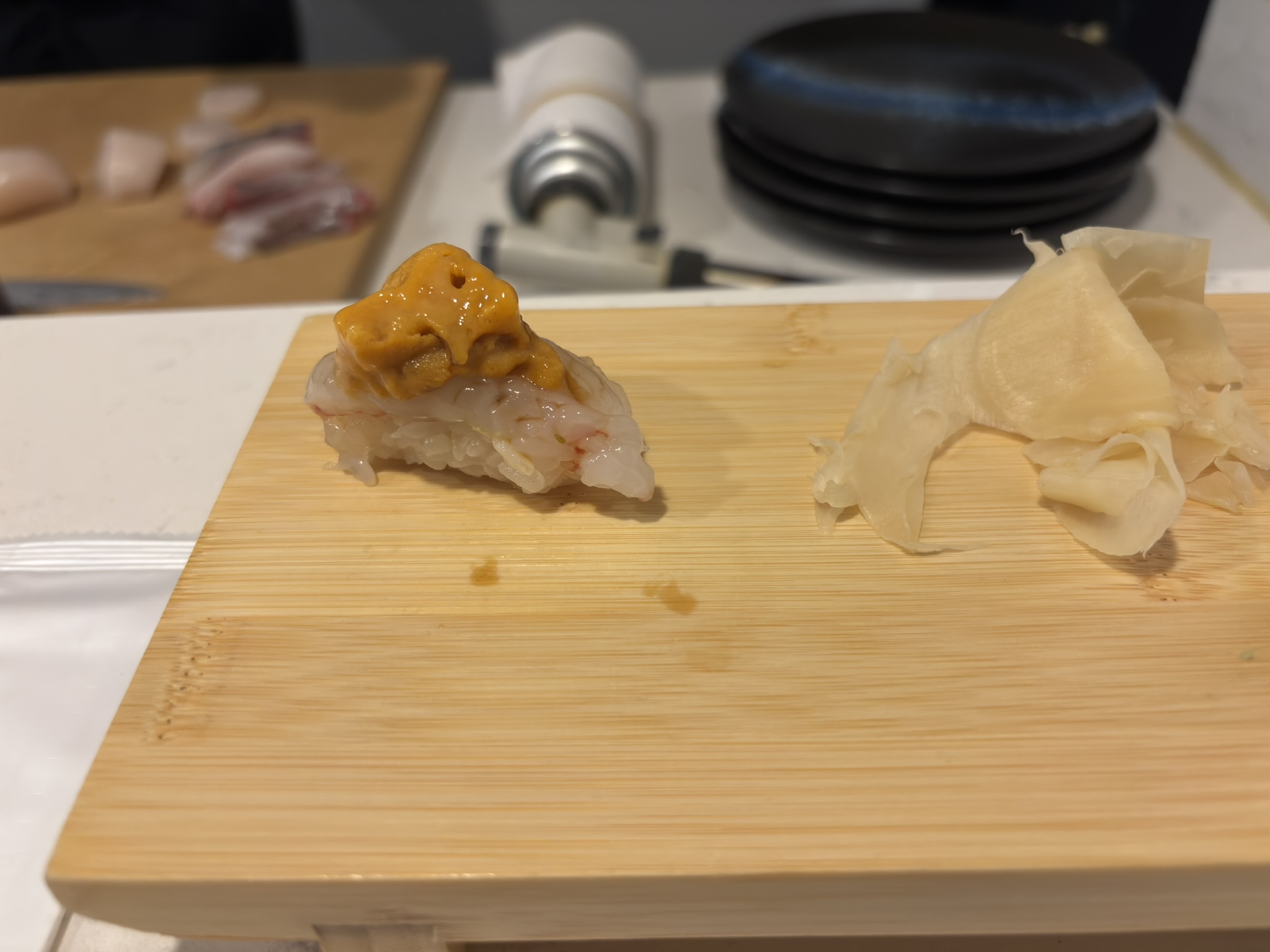 Nigiri topped with uni at Shinzo Omakase