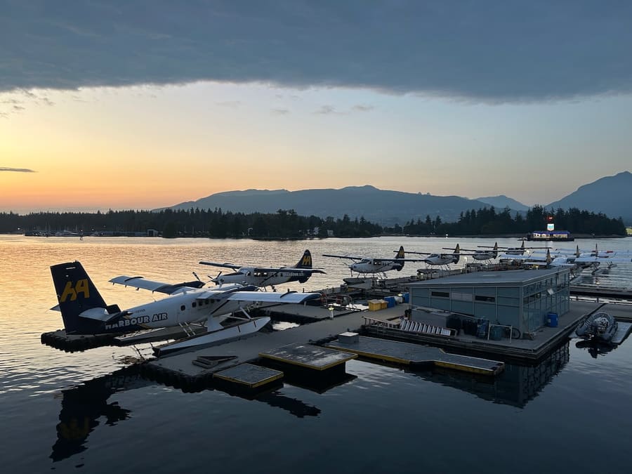 Harbour Air seaplanes on Vancouver's waterfront at sunset