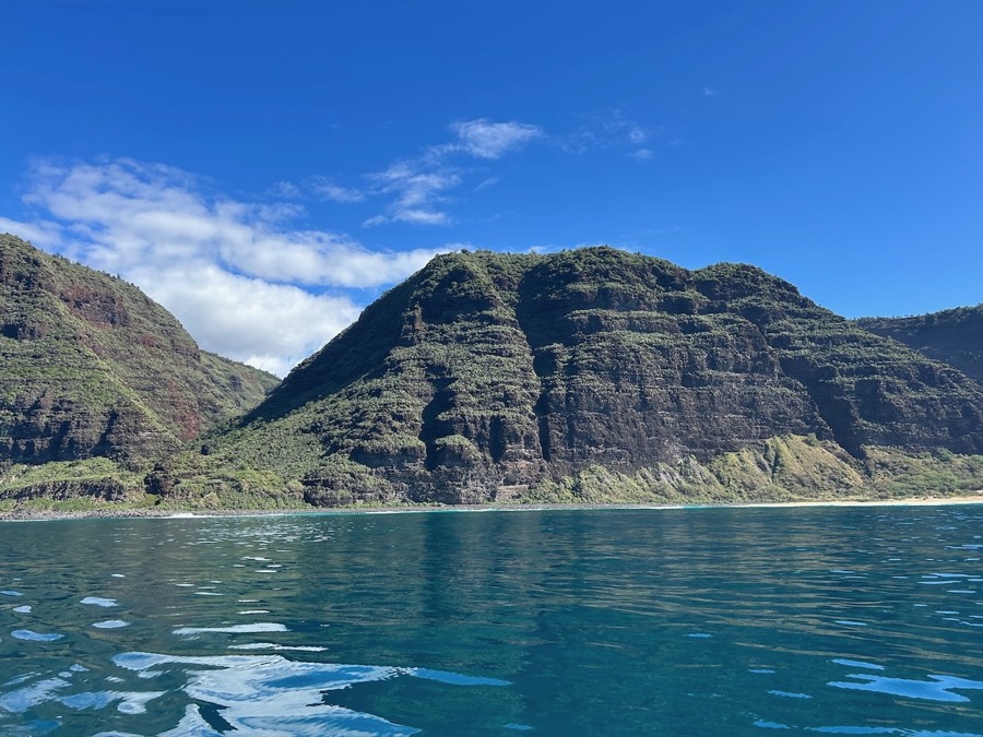 Nā Pali Coast cliffs above turquoise water