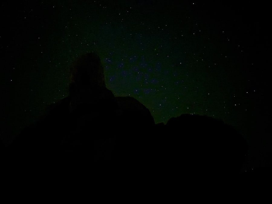 Starry sky between Joshua Tree boulders