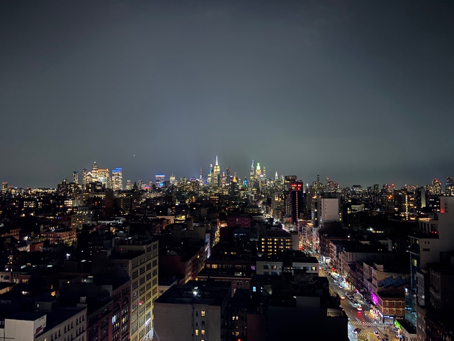 Manhattan skyline glowing at night