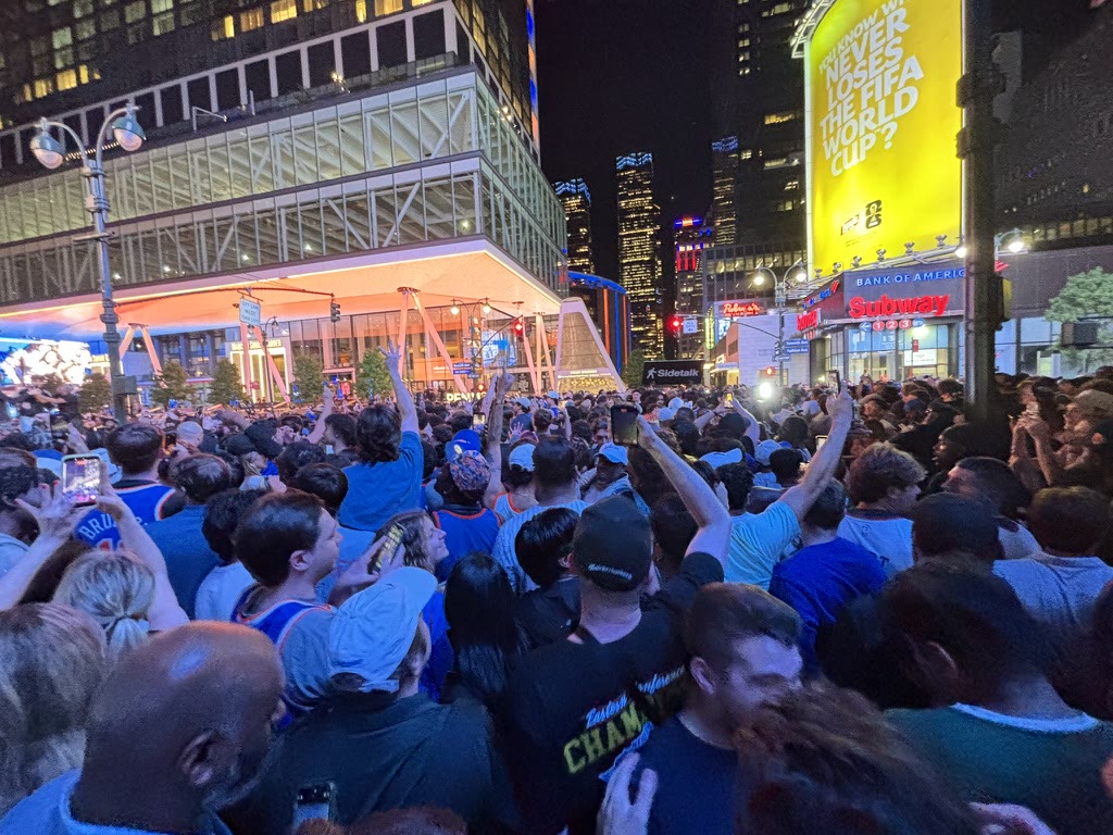 Dense crowd of Knicks fans near Penn Station after the game