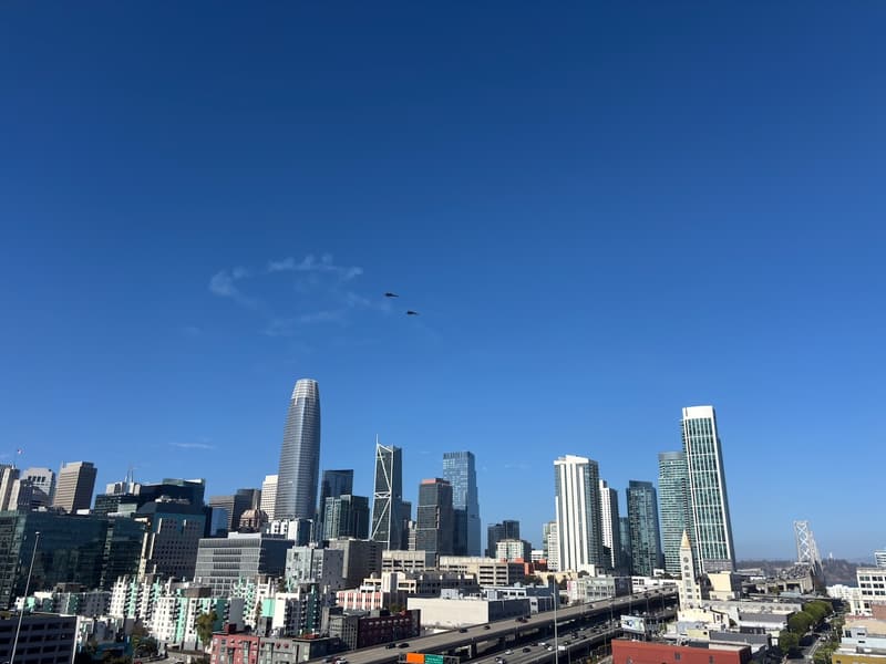 Aircraft flying in formation above the San Francisco skyline on October 10, 2026