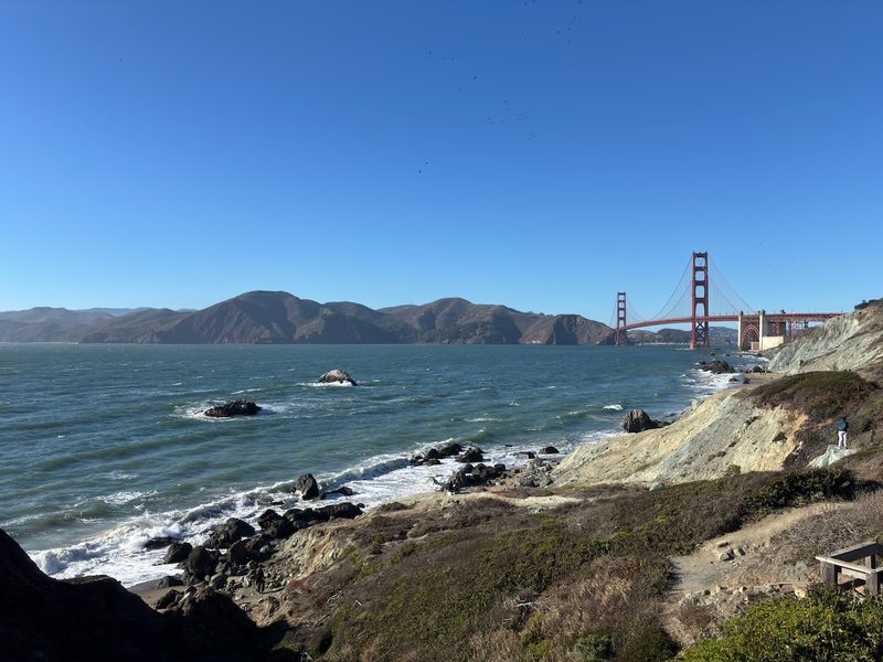 Golden Gate Bridge above the rocky San Francisco coastline