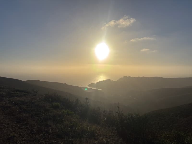 Low sun over the Pacific Ocean and hazy Marin hills