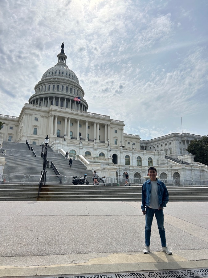 United States Capitol under a cloudy sky