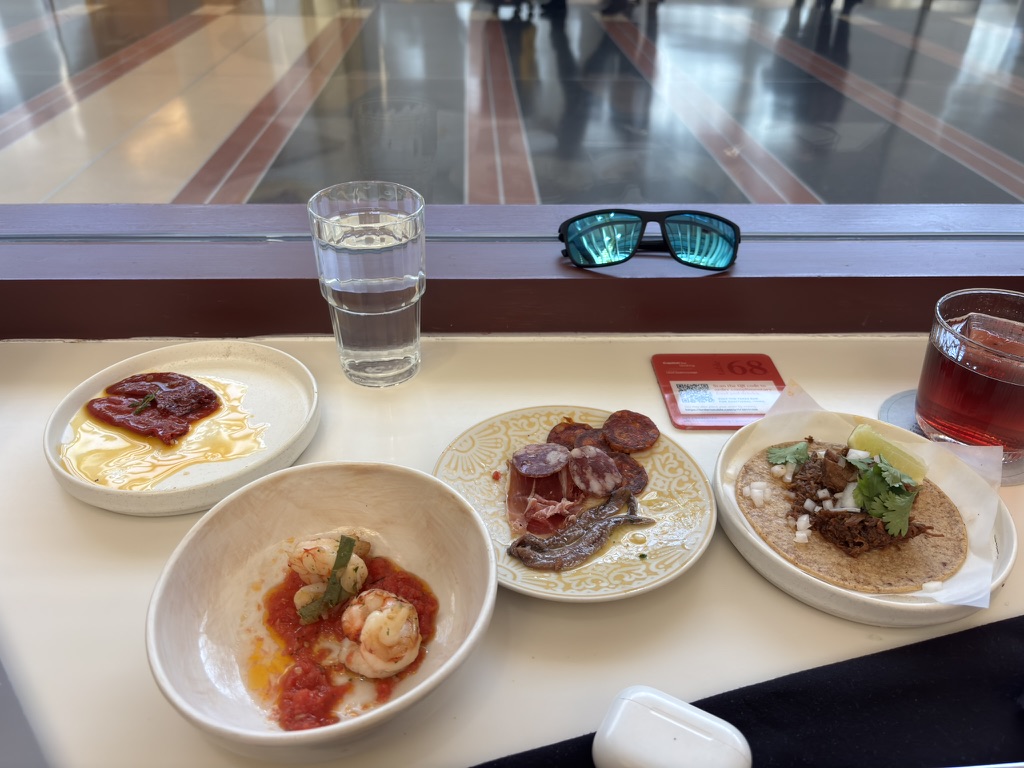 Small plates and drinks at the DCA Capital One Landing