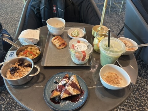 Breakfast dishes and drinks at the JFK Capital One Lounge