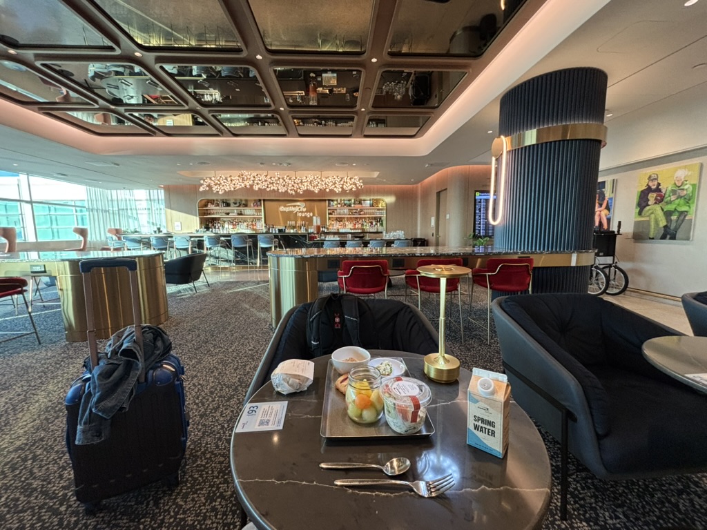 Interior seating and bar at the JFK Capital One Lounge