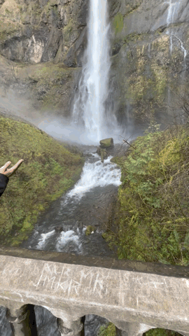 Water rushing down Multnomah Falls into the creek below